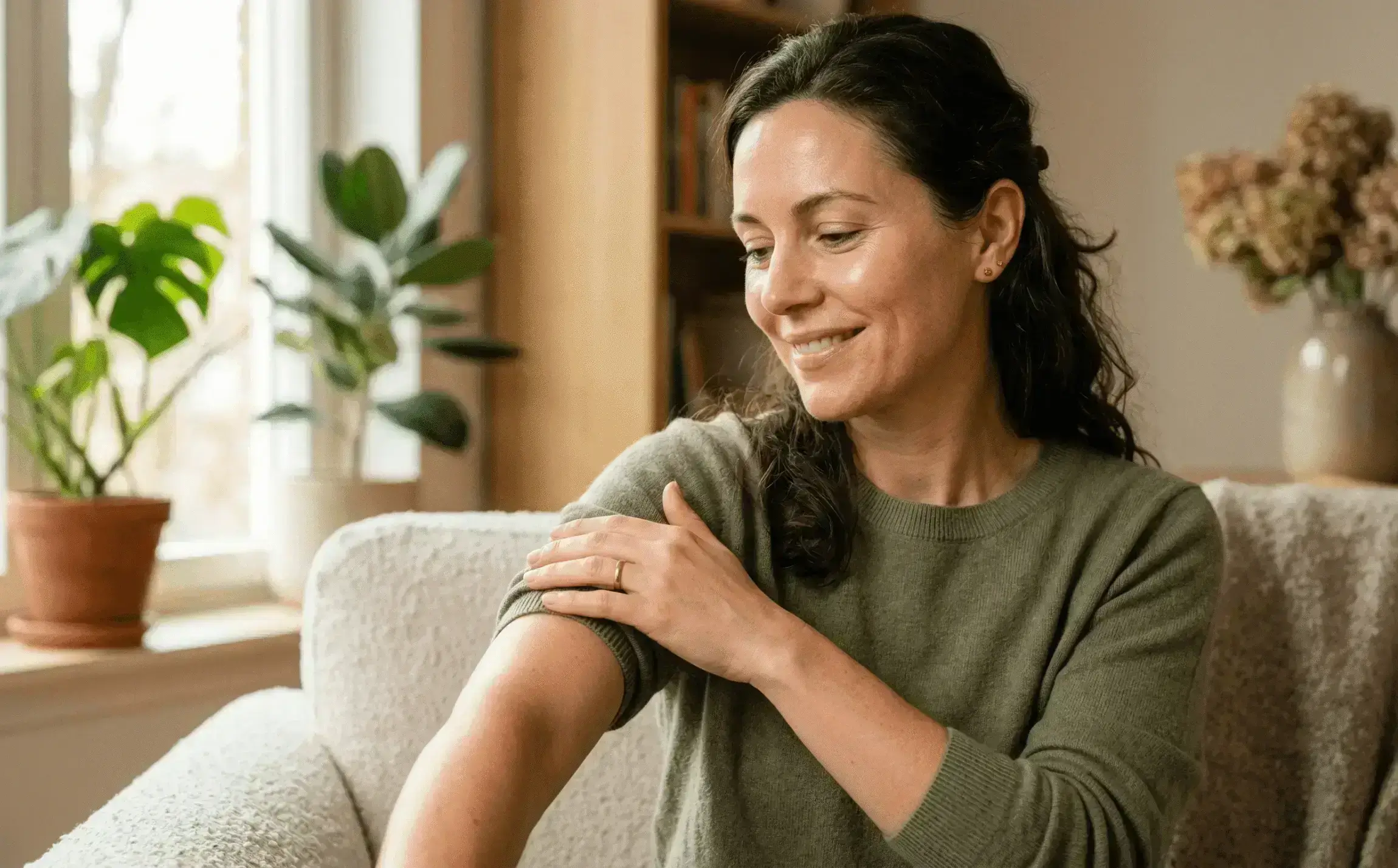 Woman relaxing at home and feeling like herself again